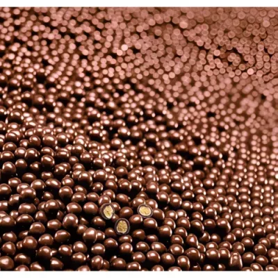 Dark chocolate-coated crunchy pearls – decoration service products